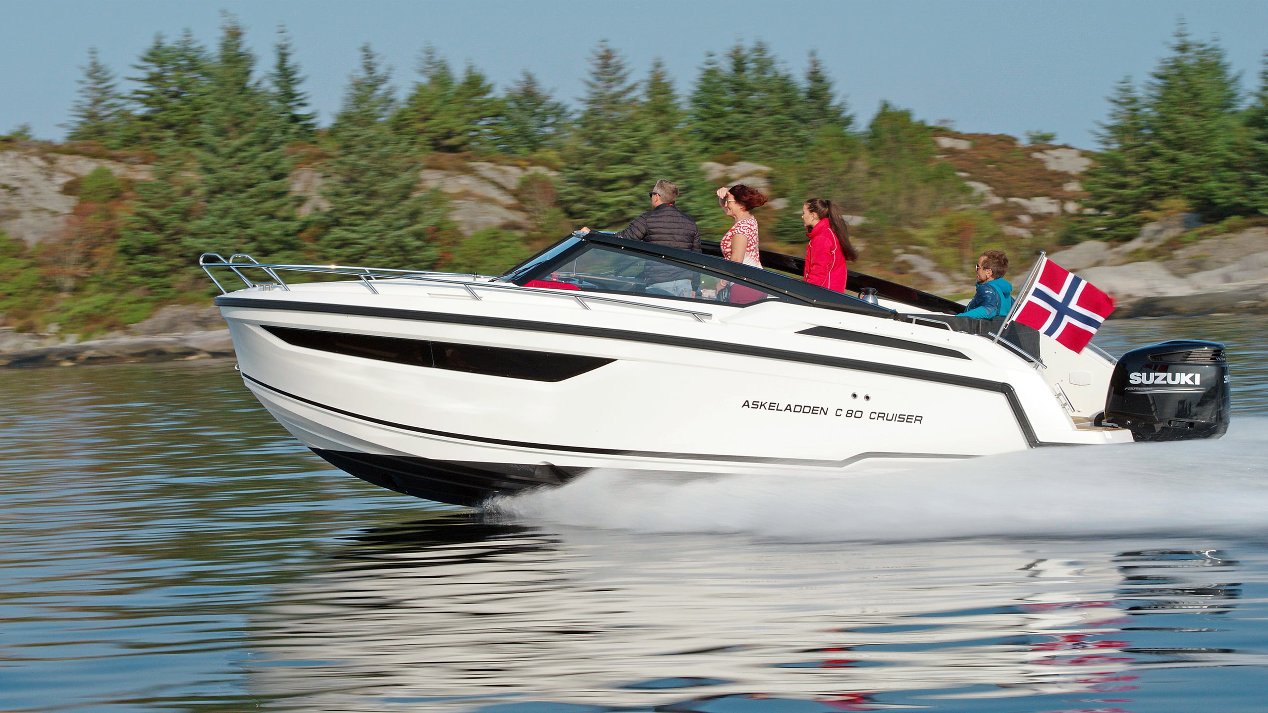 Askeladden C80 Cruiser boat featuring Click Fendering in black with four individuals enjoing a cruise