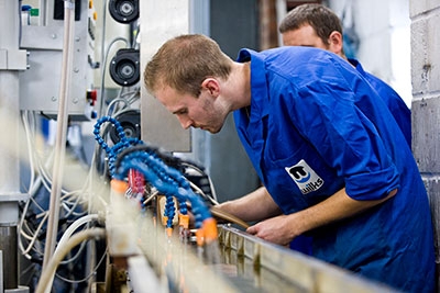 Machine Setter, Mark, observing the production line.
